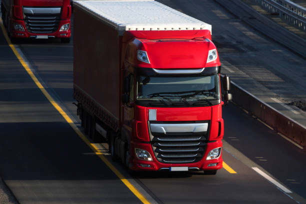 istock a modern red truck driving on an highway 1216456753