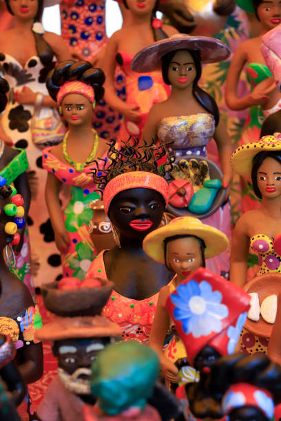 Sao Paulo, Brazil - nov 03, 2019 - Clay dolls with folk characters made by artisans from northeastern Brazil (selective focus)