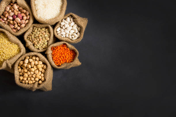istock Different type of raw dry legumes composition 1216457771