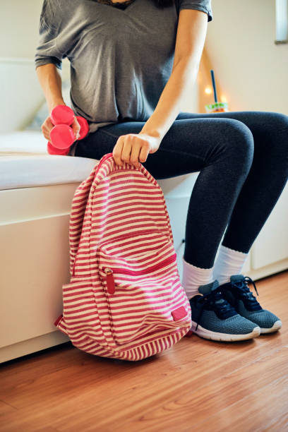istock Attractive fit woman preparing for gym. 1216459394