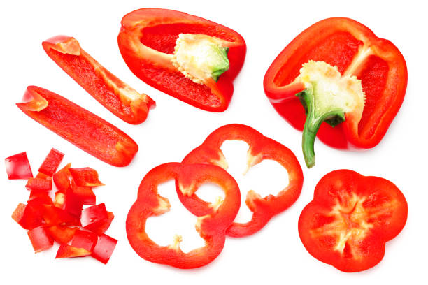 istock red sweet bell pepper with slices isolated on white background. top view 1216459868