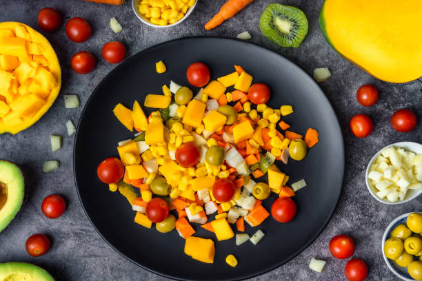 istock Tropical fruit and vegetables salad 1216460638