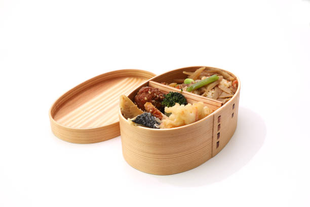 Japanese styled lunch in the wooden lunch box Japanese styled lunch in the wooden lunch box made from cedar. cryptomeria stock pictures, royalty-free photos & images