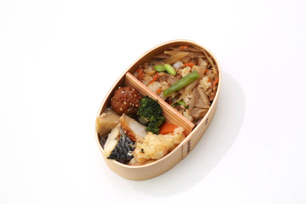Japanese styled lunch in the wooden lunch box Japanese styled lunch in the wooden lunch box made from cedar. cryptomeria stock pictures, royalty-free photos & images
