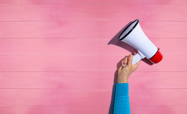 istock Person holding a megaphone 1216462423