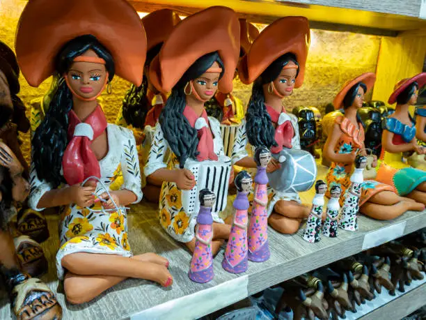 Photo of Clay dolls. Colorful clay dolls.