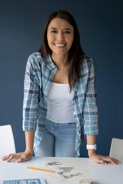 istock Happy woman working at a start up 1216468558
