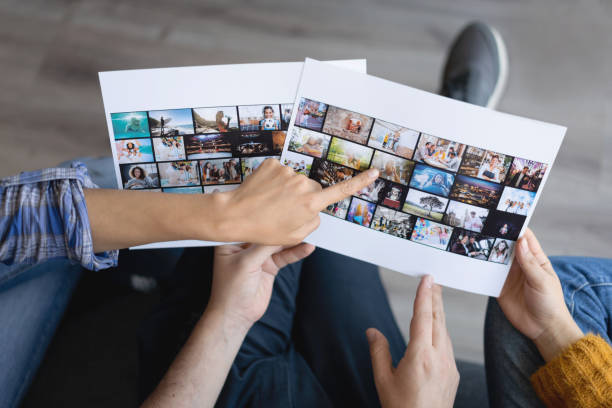 Group of designers selecting images at a creative office