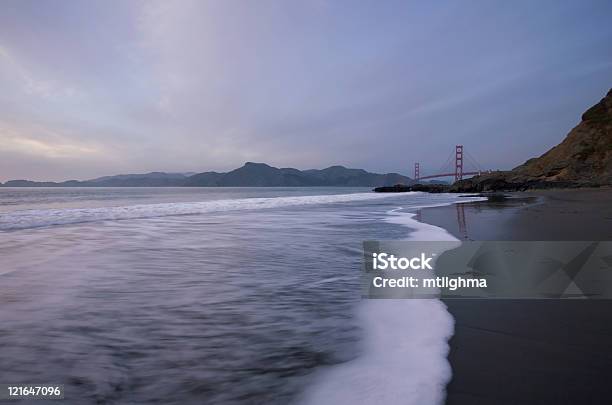 Golden Gate Bridge At Sunset Stock Photo - Download Image Now - Beach, Breaking, Golden Gate Bridge