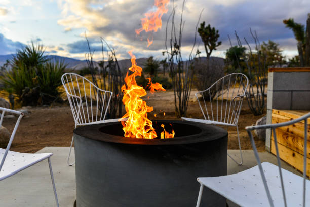 istock Fire Pit in Desert with Large Flame and Joshua Tree 1216472792