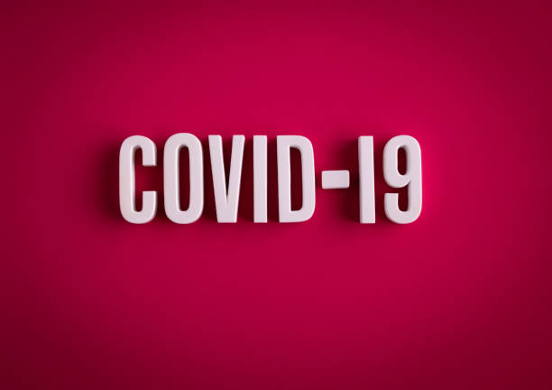 istock COVID-19 coronavirus sign lettering on a colored background 1216481586