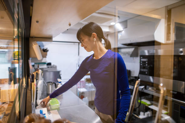 istock Young athlete woman working in kitchen 1216482966