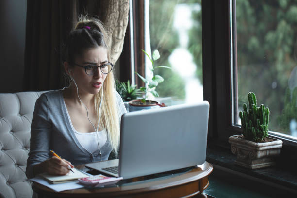 istock young woman working from home 1216485499