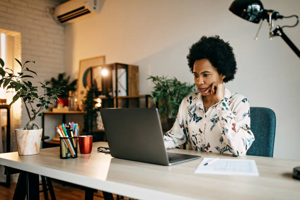 Hispanic business woman working from home Busy hispanic business woman working from home office person of color photos stock pictures, royalty-free photos & images