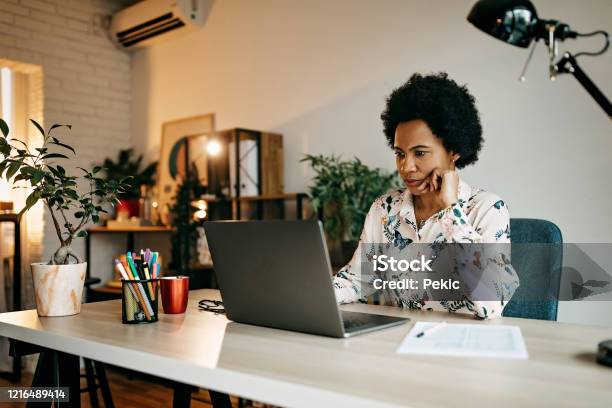 Hispanic Business Woman Working From Home Stock Photo - Download Image Now - Working At Home, One Woman Only, Laptop