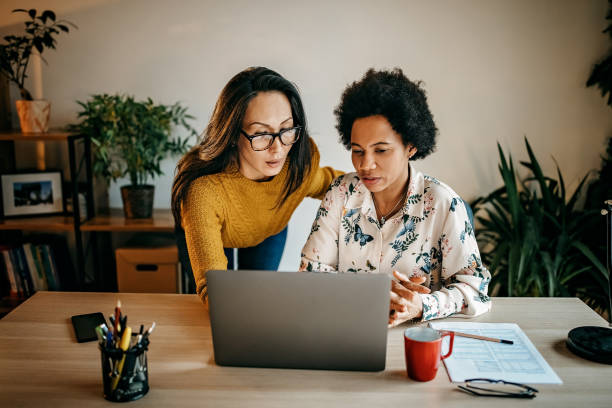 istock Two Business Women Working From Home Office 1216489717