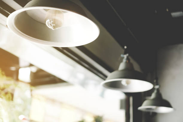 istock Vintage retro design lamp hang on ceiling minimal concept background. 1216490408