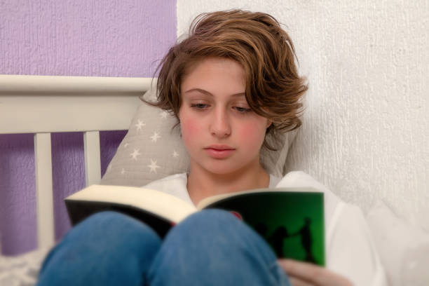 istock Teen reading in quarantine 1216491216