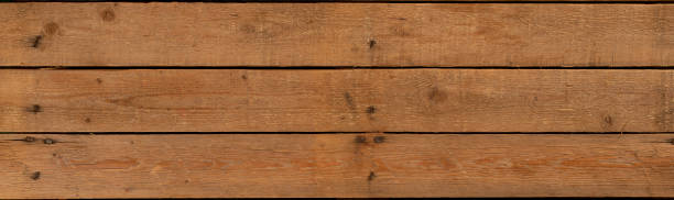 istock Wood rustic panel cover background with nails and holes 1216495799