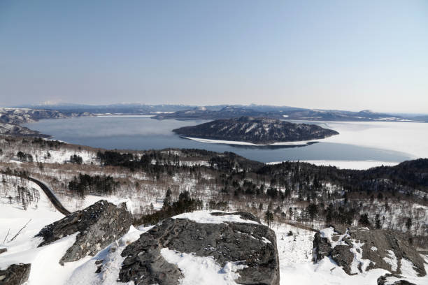 Lake Kussharo in winter in Hokkaido Japan Lake Kussharo in winter in Hokkaido Japan
Lake Kussharo is a caldera lake in Akan National Park. It is the largest caldera lake in Japan. national park akan stock pictures, royalty-free photos & images