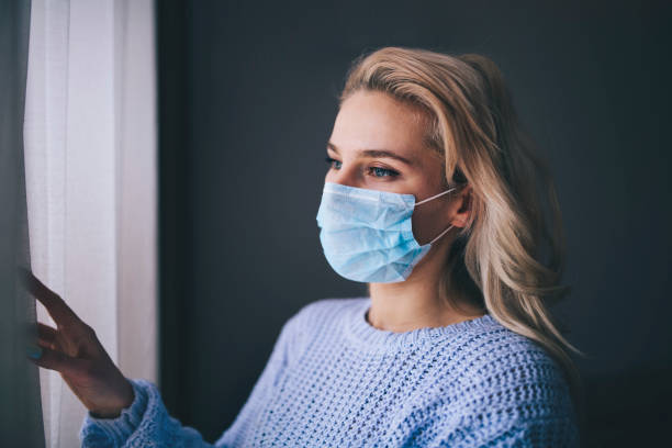 istock Woman In Isolation At Home For Virus Outbreak. 1216496050