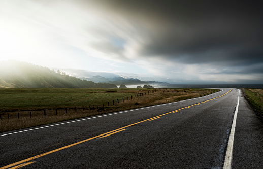 empty Oregon coast HWY  with dramatic sky.