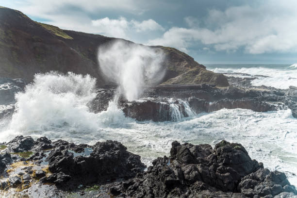 istock dramatic waves of Thor's Well 1216497558