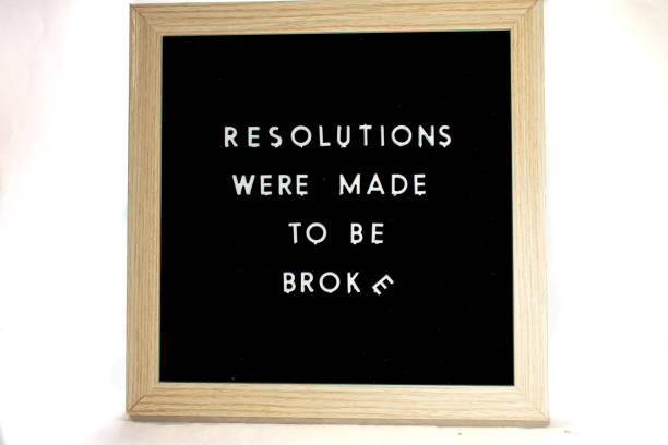 istock A Sign That Says Resolutions Were Made To Be Broke on a White Background 1216497798