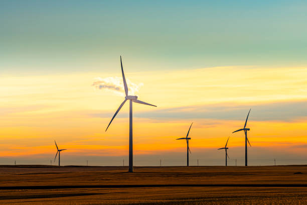 istock Wind turbines silhouette on sunset 1216498865