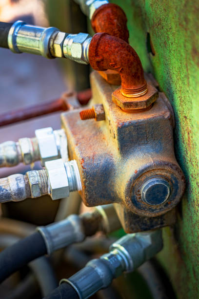 istock Closeup hydraulic control system of old tractor 1216500288