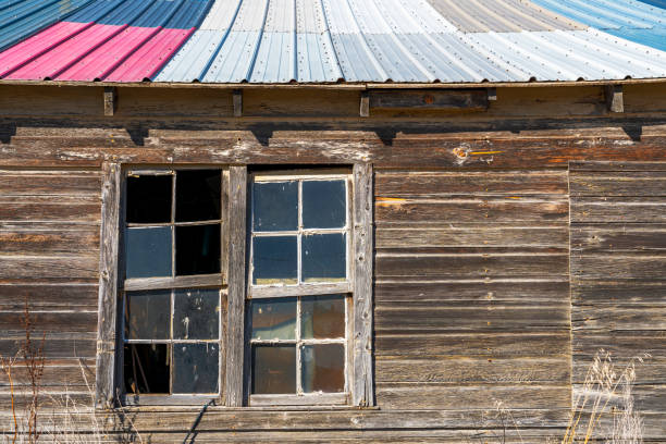 door and window of an old building, SK, Canada.