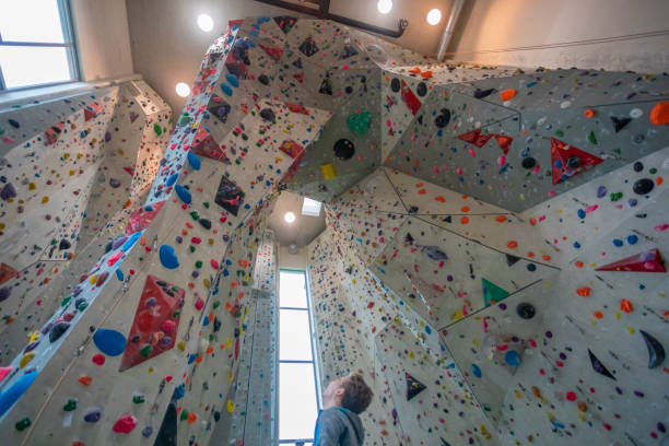 istock Young Woman Indoor Rock Climbing 1216503164