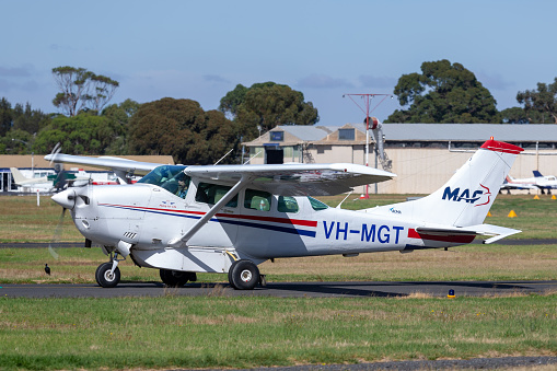 Moorabbin, Australia - March 26, 2014: Cessna 206 Turbo Stationair VH-MGT operated by Mission Aviation Fellowship taxis at Moorabbin Airport.