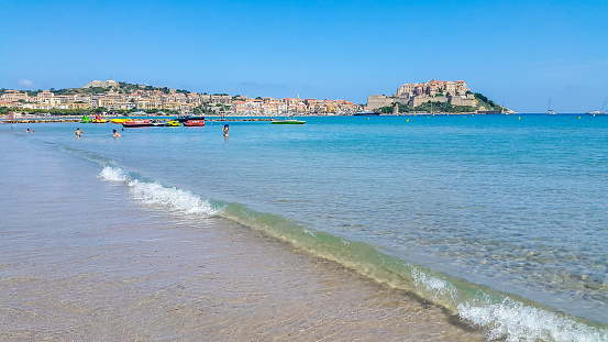 Calvi Beach with view on the Citadelle, Calvi Fort, Corsica, France