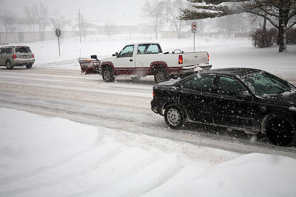 istock cars driving in the snow 121650636
