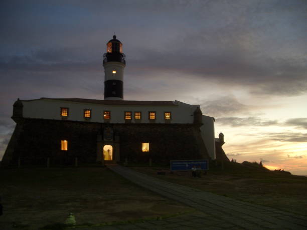 Barra lighthouse in Salvador at sunset, Bahia, Brazil stock photo