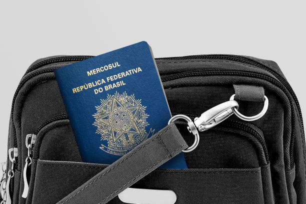 close-up do brazil passport em black travel bag pocket - global business passport transportation italy - fotografias e filmes do acervo