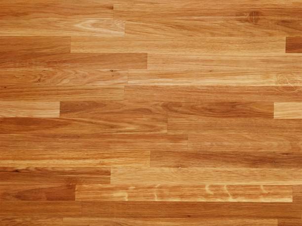 istock parquet wood texture, dark wooden floor background 1216514189