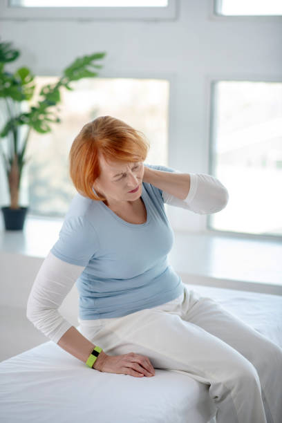 istock Tired aged woman feeling a strong pain 1216517023