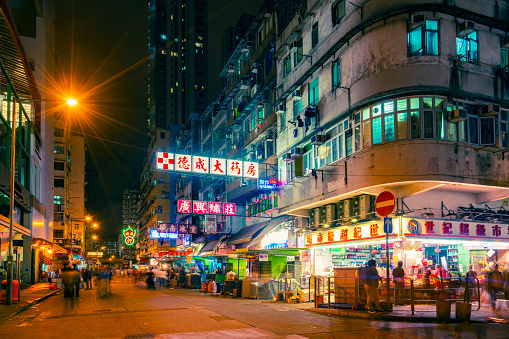 Apliu street at night in Sham Shui Po district, surrounded by advertising placards, Sham Shui Po is known for its street market for electronic devices.