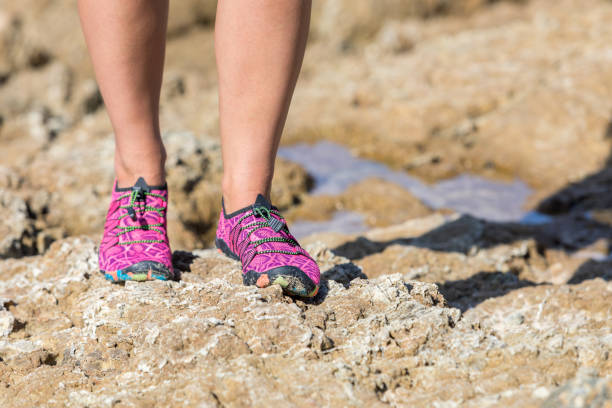 istock The person is shod in protective coral slippers 1216519085