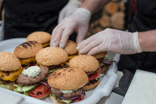 istock Preparing burgers at a restaurant. 1216522416