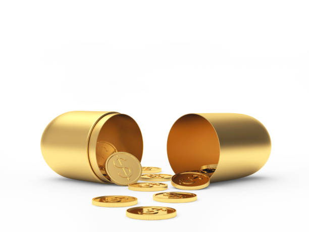 istock Golden open medical capsule and coins with a dollar 1216523441