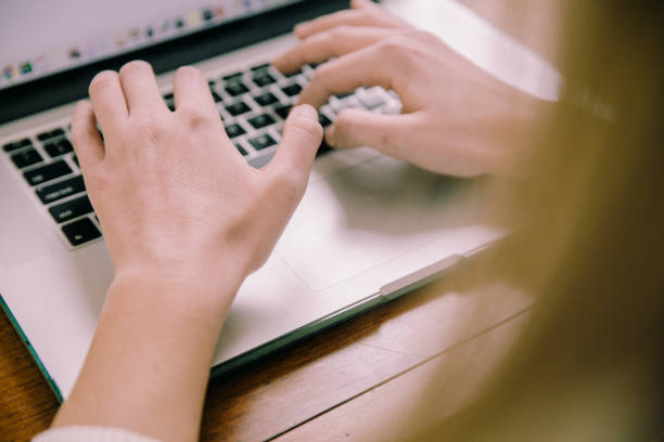 istock Businesswoman Using Laptop at Home 1216524792