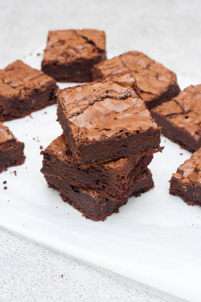 istock Freshly baked chocolate chewy brownie, cut into nine square pieces. 1216526145