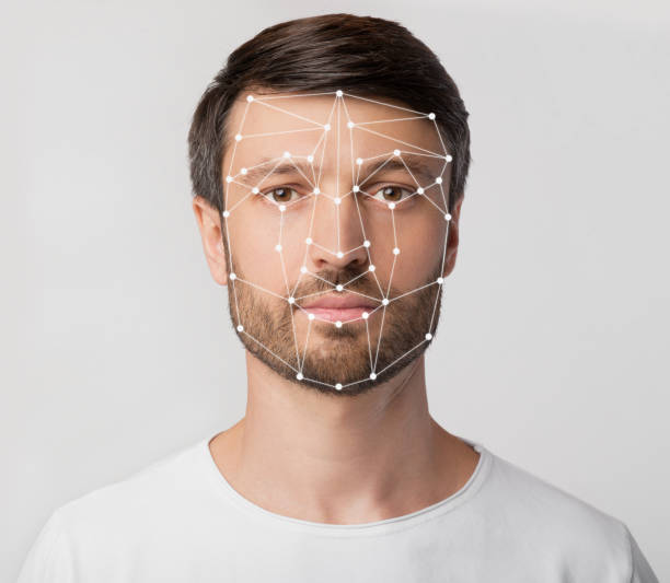 Personal safety. Caucasian man with face scanning grid on light background Personal safety concept. Caucasian man with face scanning grid on light background biometrics stock pictures, royalty-free photos & images