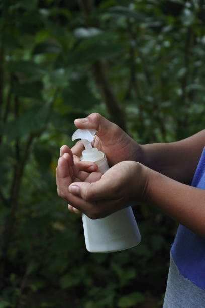 istock Washing hands using a hand sanitizer to prevent the Covid-19 outbreak 1216530809