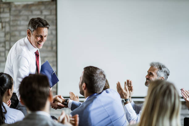 istock Successful deal on a presentation in board room! 1216533893