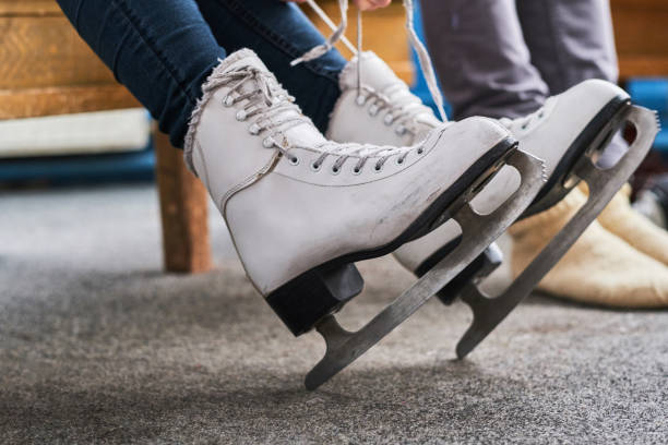 istock Young couple preparing to a skating 1216536154