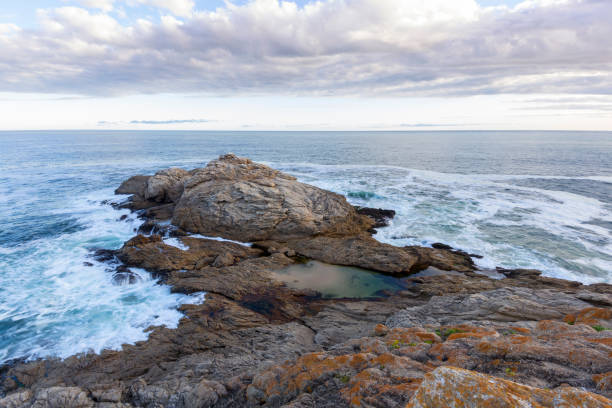 istock rocky ocean view at dusk dawn 1216536641